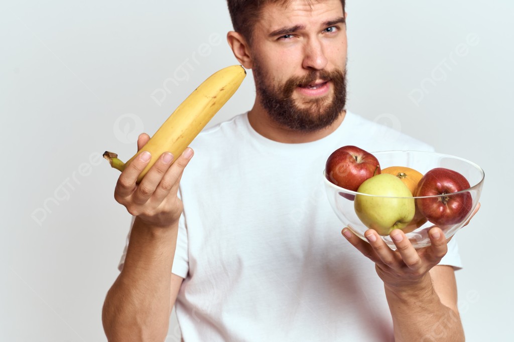 Hombre adulto con alimentos saludables — bienestar masculino
